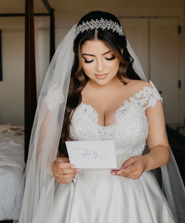 Roko and Shak applying hair style and makeup to bride.